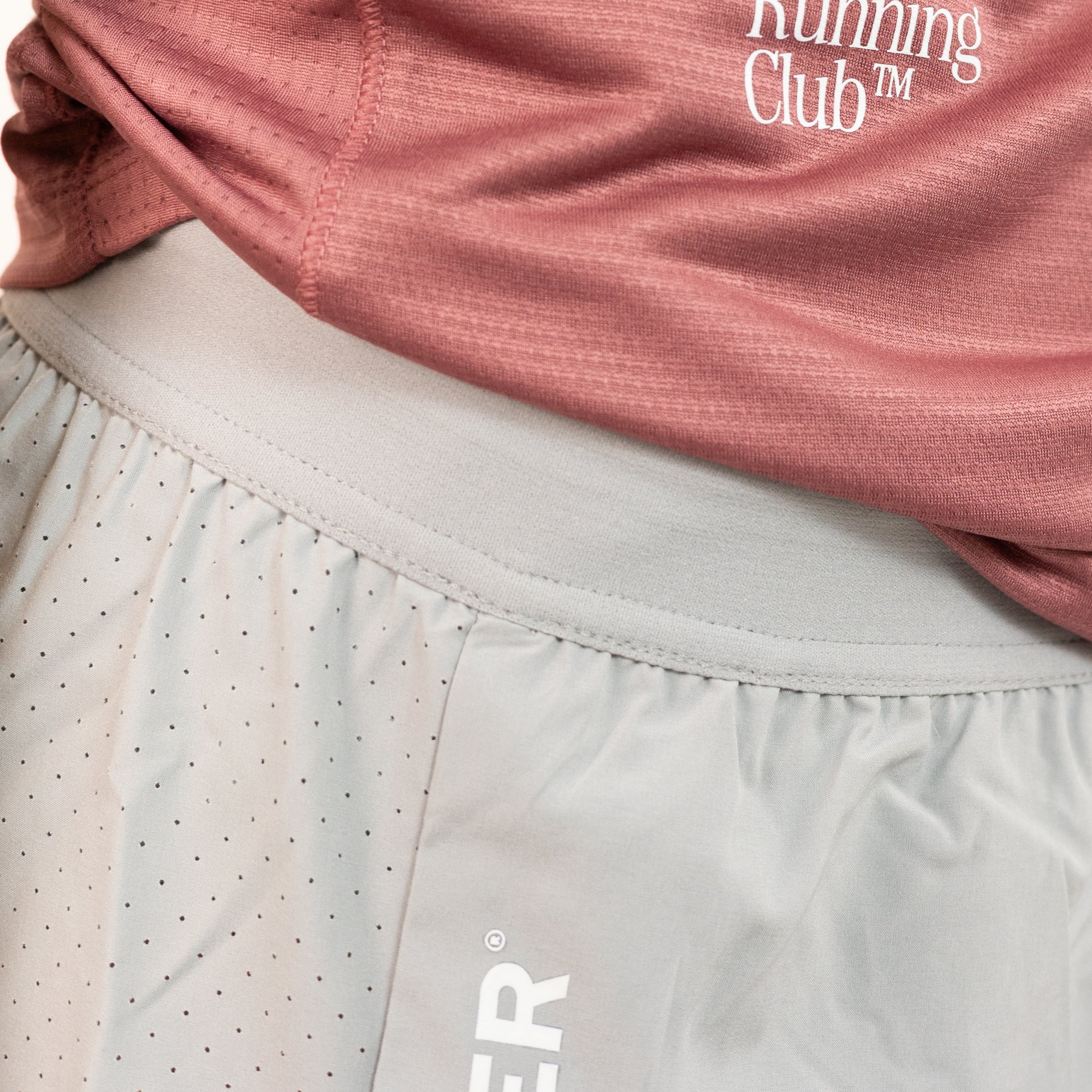 SHORTS RUNNING GRIS MUJER