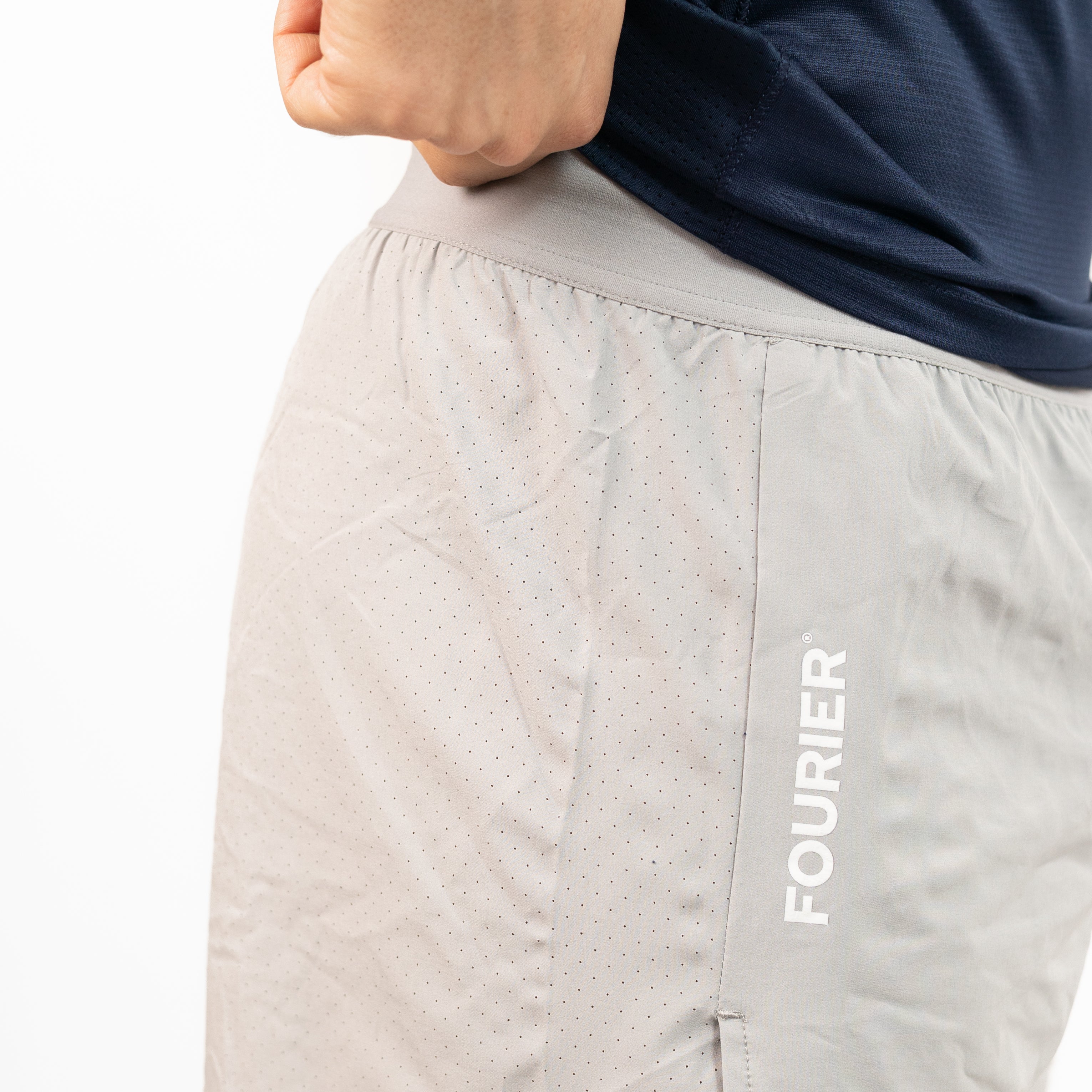 SHORTS RUNNING GRIS HOMBRE